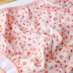 Úszóruha babáknak UPF 50+ Old pink Leopard színnel Úszóruha babáknak UPF 50+ Old pink Leopard színnel