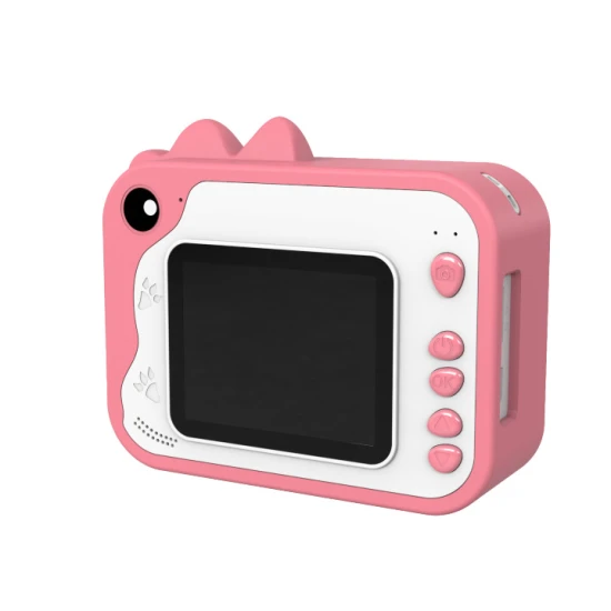 Gyerekkamera Kiddoboo FotoFun 2 Dino Pink - rózsaszín azonnali kamera gyerekeknek azonnali nyomtatással, színes markerekkel és szórakoztató képkeretekkel.
