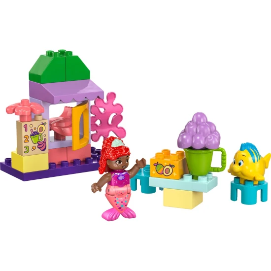 LEGO DUPLO készlet Ariellel és Šupinkával egy játékos kávésállványon.