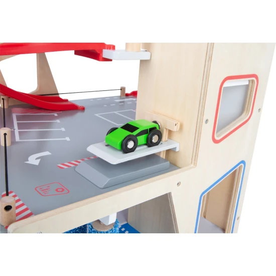 Háromszintes garázs mágneses elemekkel kis versenyzőknek.