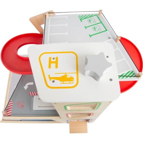 Háromszintes garázs mágneses elemekkel kis versenyzőknek.