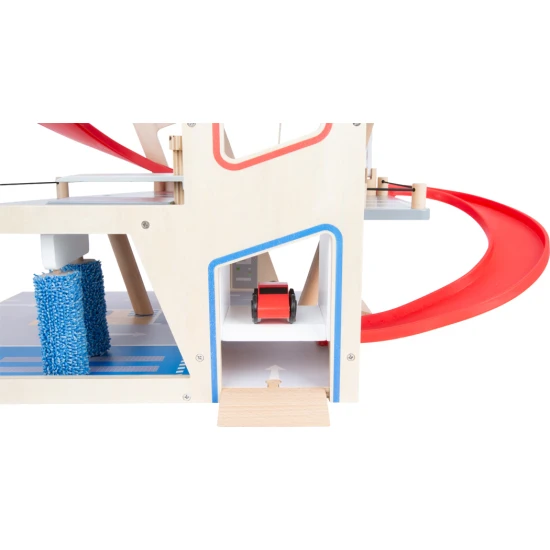 Háromszintes garázs mágneses elemekkel kis versenyzőknek.