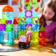 Mágneses építőkészlet MAGNA-TILES City Center - 110 rész utakkal, lépcsőkkel, autókkal és városi elemekkel