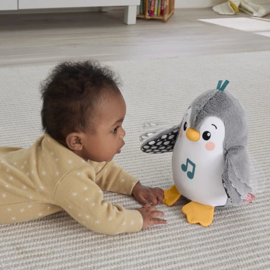 Inteaktív hullámzó és integető pingvin – Plüss játék az érzékek fejlesztésére Interaktív plüsspingvin Fisher-Price® szárnycsapkodással és zenével babák számára