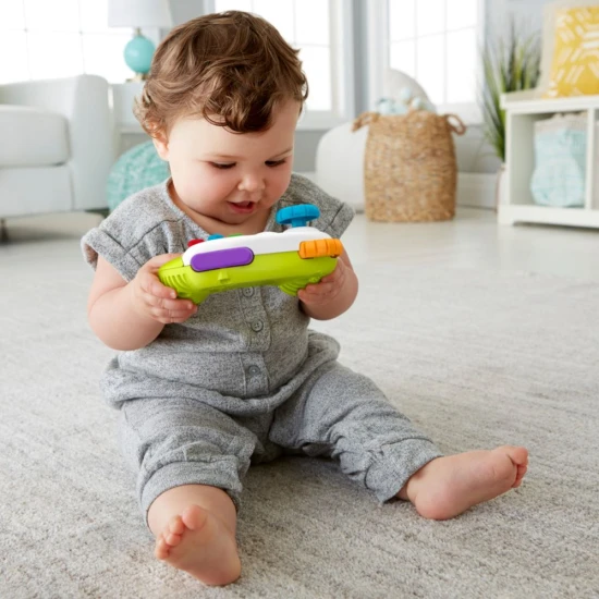 Fisher-Price® játékvezérlő baba és kisgyermekek számára mozgatható joystickkal, ABCD gombokkal és számokkal, amelyek fényeket és zenét aktiválnak