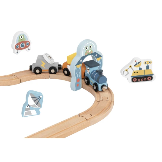 Űrvonat pálya űrhajósokkal, egy UFO-val és egy űrrakétával.