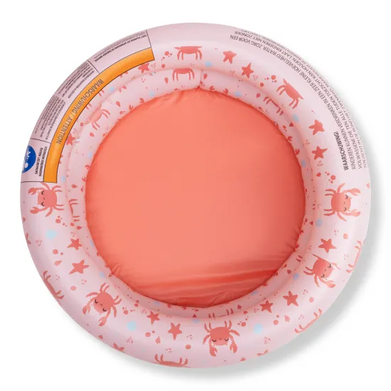 A Swim Essentials kisméretű, kerek, felfújható rákmotívumú medence kisgyermekek számára készült.