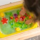 Glo Pals Set Elmo figura és 2 szenzoros vízkocka - világító fürdőjáték gyerekeknek.