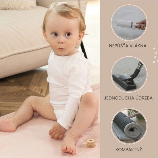 Rózsaszín gyerekszőnyeg a biztonságos és kényelmes játékért.