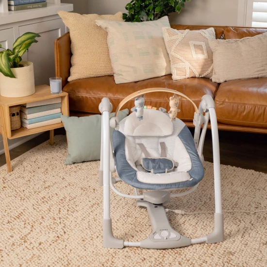 Swing 'n Go Chambray átalakítható zenélő hinta 0h+ 9kg-ig Swing 'n Go Chambray átalakítható zenélő hinta 0h+ 9kg-ig Ingenuity 16925-1