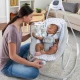 Raylan nagy hinta vibráló pihenőüléssel és zenével USB 2az1-ben 0h+ 9 kg-ig Raylan nagy hinta vibráló pihenőüléssel és zenével USB 2az1-ben 0h+ 9 kg-ig Ingenuity 11791-1