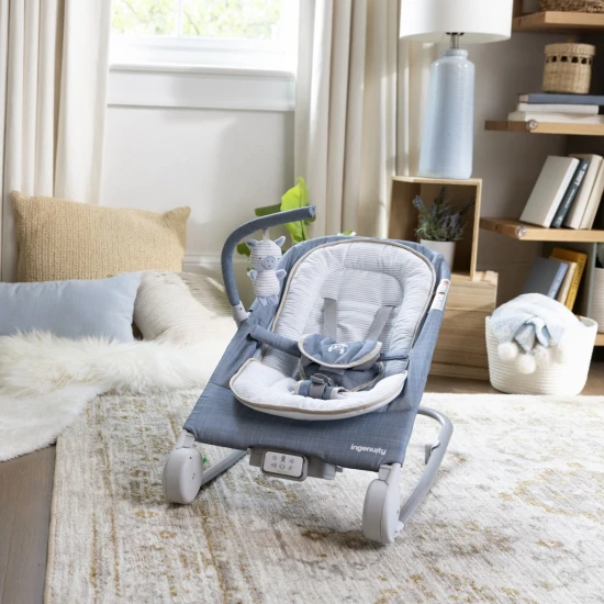 Happy Belly™ Rock-to-Bounce Chambray vibráló, zenélő masszázsülés 0h+ 9 kg-ig Ingenuity 16854-2