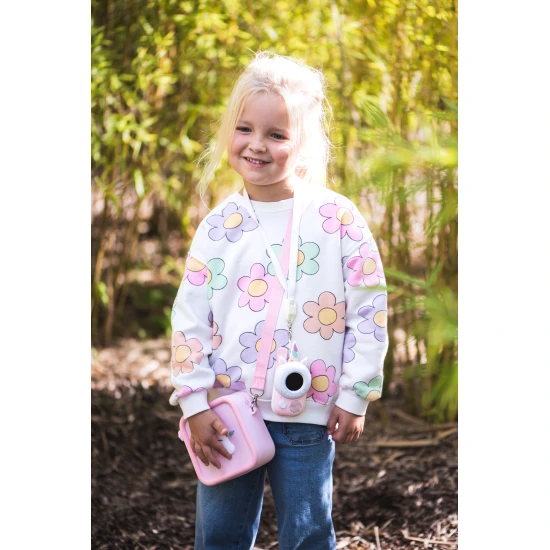 Szilikon táska a fényképezőgép biztonságos hordozásához.